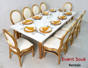 Avalon-dining-table-gold-legs-and-gold-wooden-dior-chairs-rental-dubai