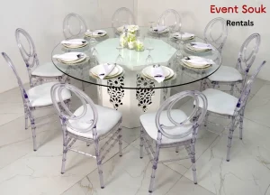 azzurra-round-glass-dining-table-and-acrylic-dior-chair-rental