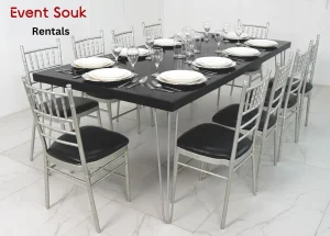isadora-black-dining-table-with-silver-chivari-chairs-rental